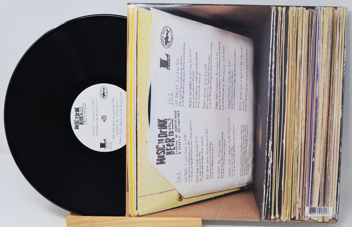Vinyl record with a book-like cover on a white background