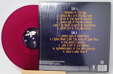 Vinyl record with a red disc and black cover displaying tracklist on a white background