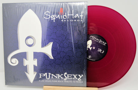 Vinyl record with red disc and Squid Hat Records packaging on a white background