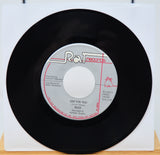 Vinyl record with 'Rat Records' label on a white background