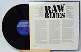Vinyl record with 'Raw Blues' cover and London label visible