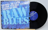 Vinyl record and cover titled 'Raw Blues' featuring John Mayall, Eric Clapton, and others.