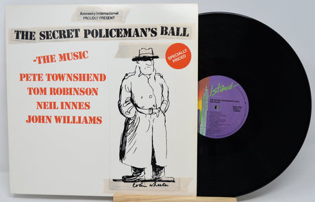 Vinyl record with cover featuring 'The Secret Policeman's Ball' and artist names.