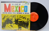 Vinyl record with colorful cover featuring a band and text 'The Heart of Mexico'.