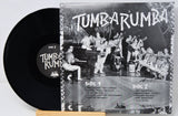 Vinyl record with cover featuring a band and text 'Tumba Rumba' on a light gray background.