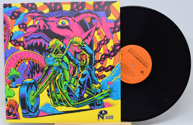 Vinyl record with a colorful cover featuring a motorcycle and abstract design.