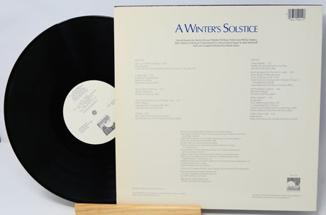 Vinyl record with cover displaying 'A Winter's Solstice' text