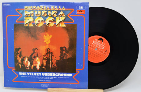 Vinyl record with 'The Velvet Underground' cover and blue sleeve on a white background