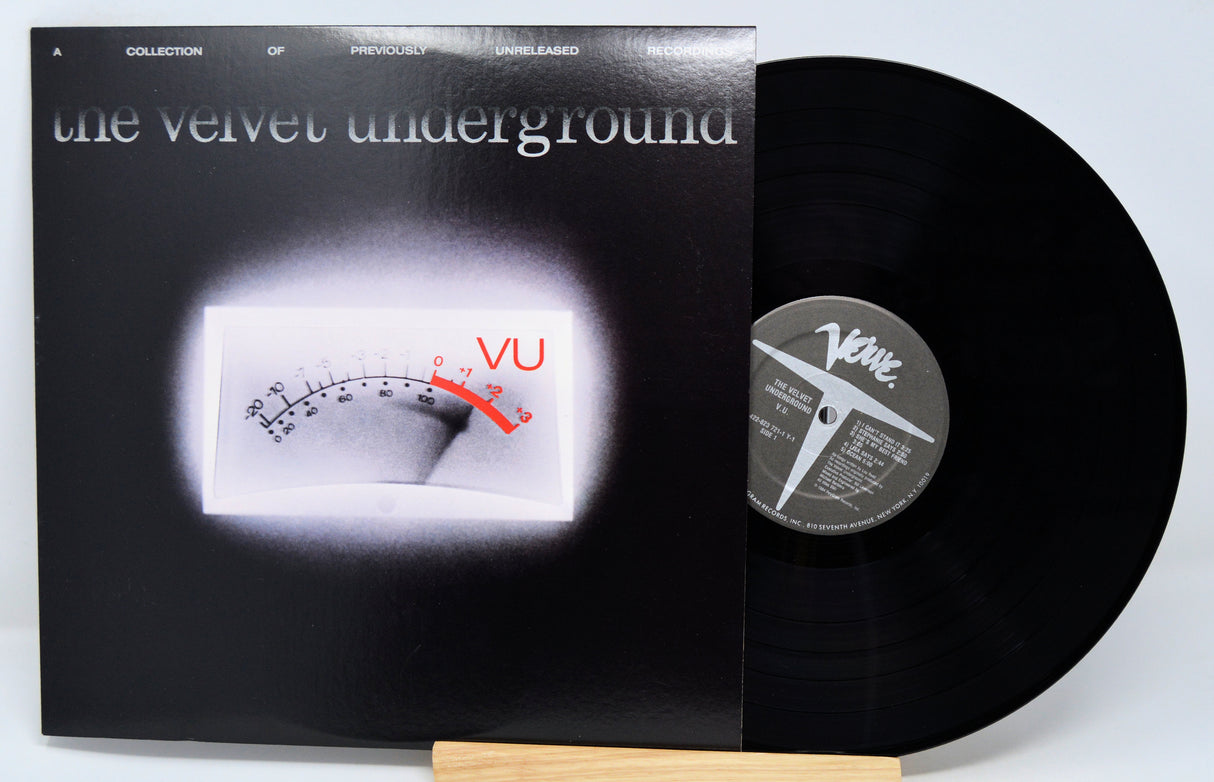 Vinyl record with cover featuring 'the velvet underground' and 'VU' logo.