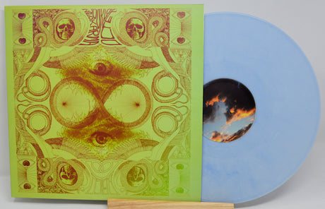 Psychedelic album cover art next to sky blue vinyl record with unique label design