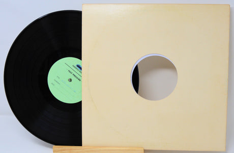 Vintage vinyl test pressing LP with blank sleeve partially open