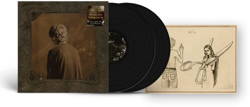 Preacher’s Daughter vinyl record with album cover and illustrated booklet featuring a woman with large scissors