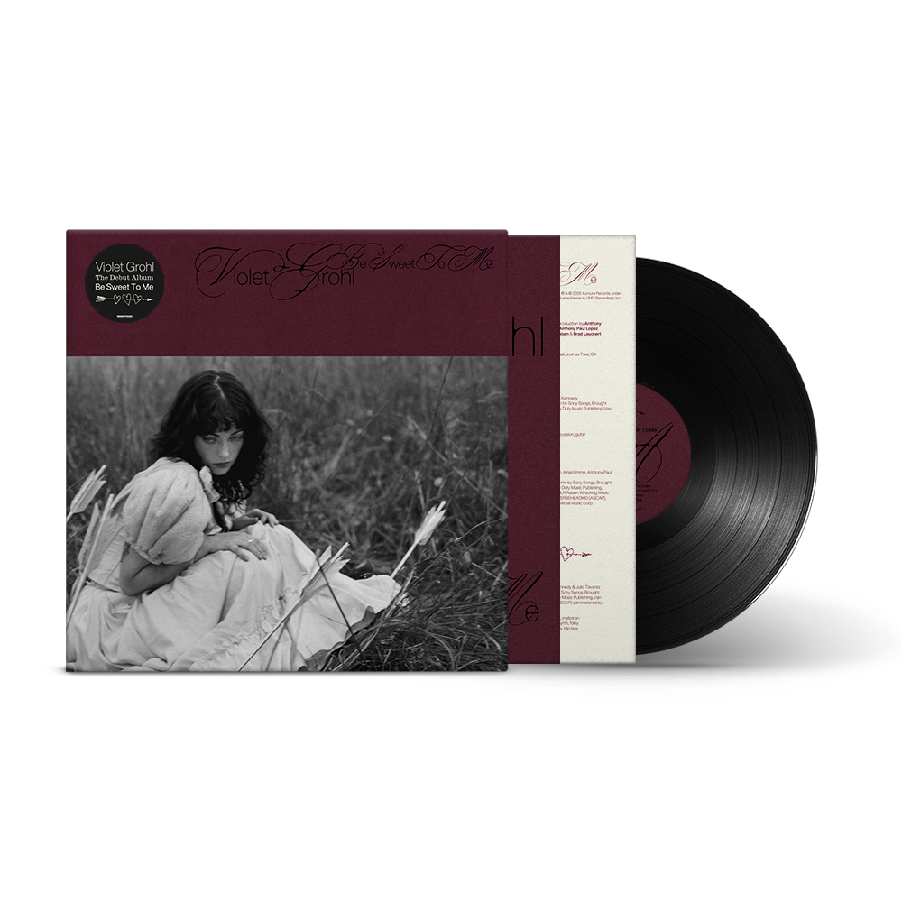Vinyl record with cover featuring a black and white photo of a person in nature.