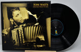 Vinyl record and cover of 'Franks Wild Years' by Tom Waits