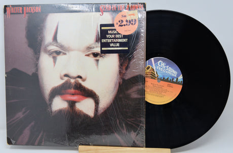 Vinyl record with cover featuring a portrait and 'Chic-Agogo' label.