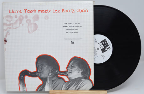 Front album cover of Warne Marsh meets Lee Konitz Again with record, saxophone artwork