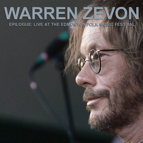 Album cover featuring Warren Zevon performing live at the Edmonton Folk Music Festival