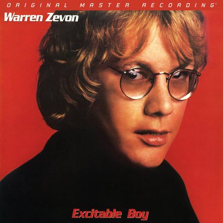 Album cover with a person wearing glasses against a red background, featuring the text 'Warren Zevon' and 'Excitable Boy'.