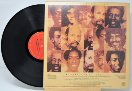 'Weather Report Mysterious Traveller' Vinyl record with a colorful album cover featuring multiple portraits.