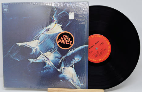 Vinyl record with a blue cover featuring 'The Nice Price' logo on a white background