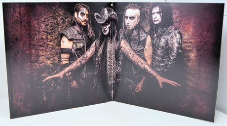 Wednesday 13 band portrait with horror-inspired makeup and attire against a grungy background