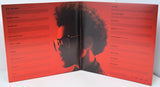 Album cover with a silhouette of a person wearing sunglasses on a red background