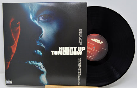 Vinyl record with a dramatic cover featuring a close-up of a person's face.