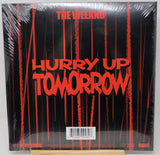 Vinyl record cover for 'Hurry Up Tomorrow' by The Weeknd with red text on a black background.