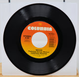 Vinyl record with Columbia label featuring George Michael's 'Careless Whisper'.