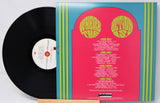 Back cover and vinyl record for 'Where the Action Is! Los Angeles Nuggets', featuring tracklist and psychedelic design