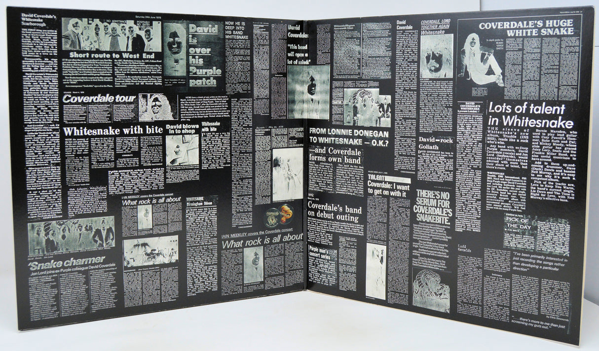 Vinyl record with cover featuring a摧毁ed building and 'U2 The Unforgettable Fire' text
