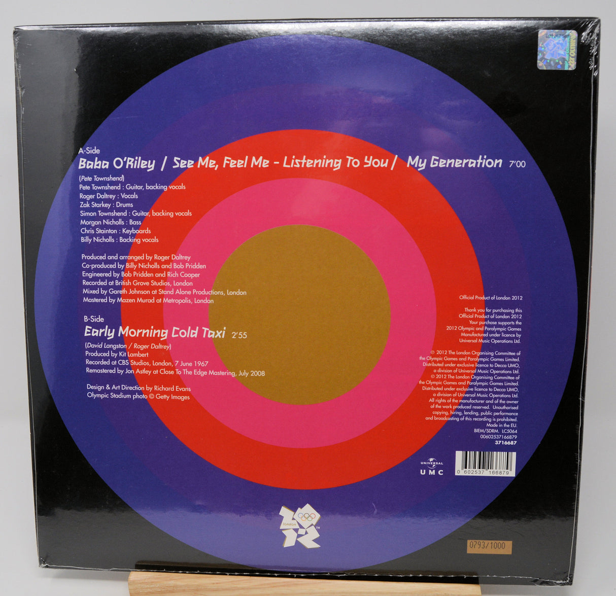 Vinyl record with a colorful label on a white background