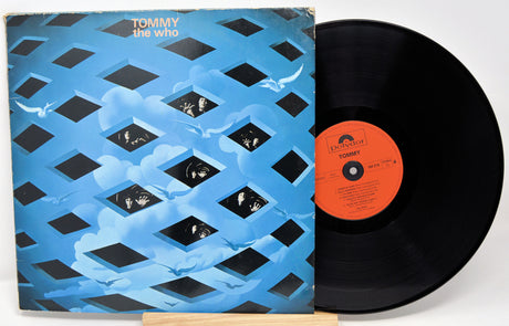 Vinyl record and cover with 'Tommy' by The Who on a white background