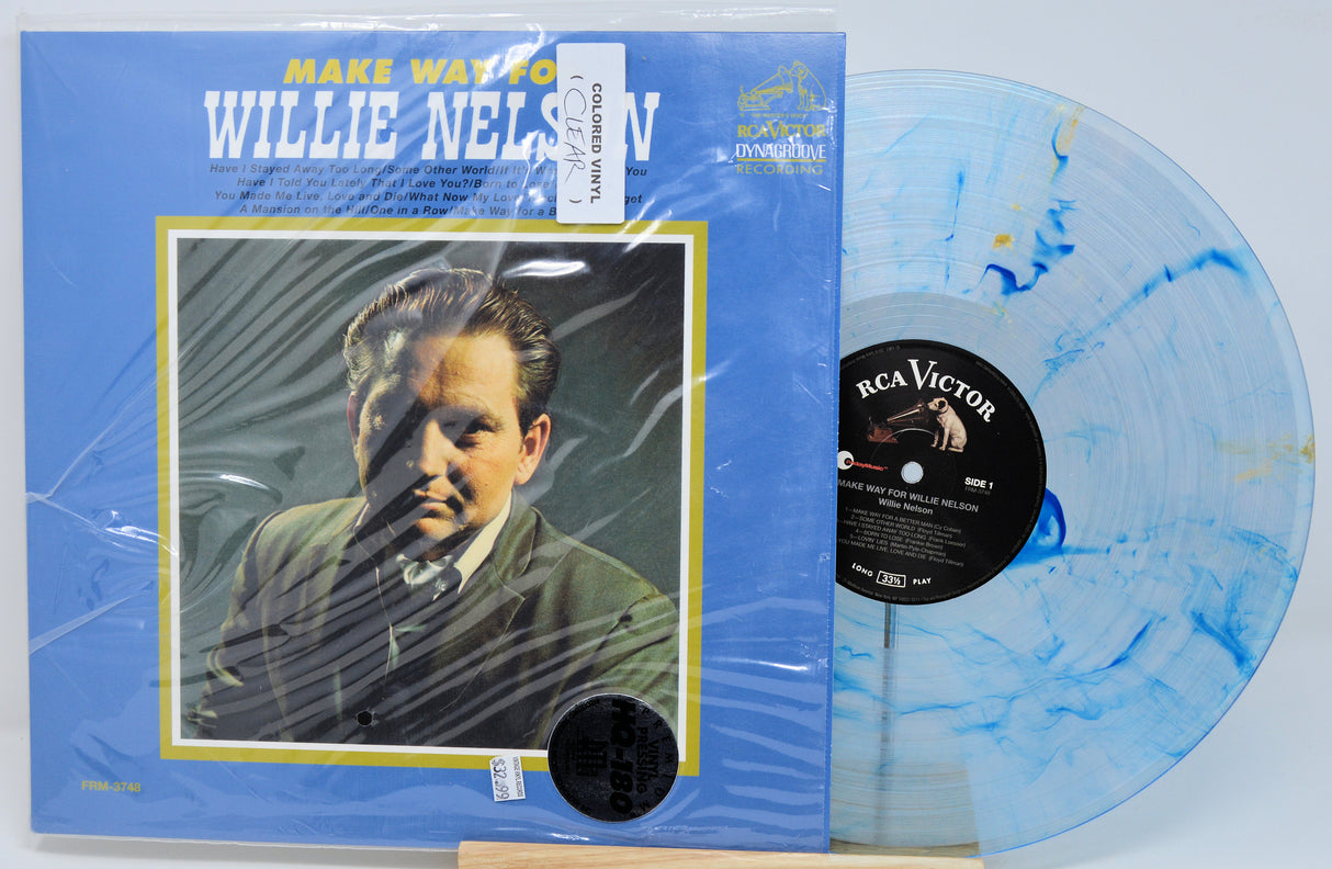 Willie Nelson 'Make Way For' vinyl record LP with the blue marbled record partially slid out of its sleeve, photographed on a white background.