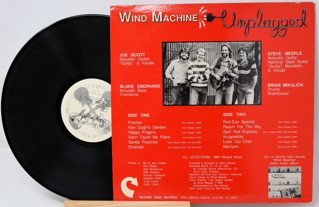 Vinyl record with cover featuring 'Bee Gees Greatest' on a white background