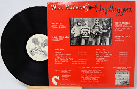 Vinyl record with cover featuring 'Bee Gees Greatest' on a white background