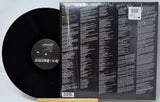 Vinyl record with a detailed back cover listing.