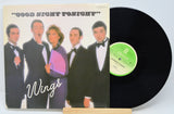 Front cover of Wings' Good Night Tonight vinyl single, showing the band in tuxedos with a purple fan, alongside the vinyl record