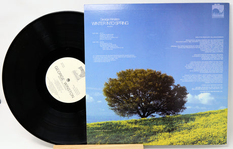 Vinyl record with a tree on the cover
