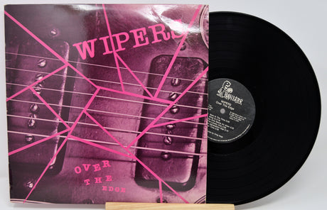 Vinyl record with a pink and black cover featuring the band 'Wipers'.