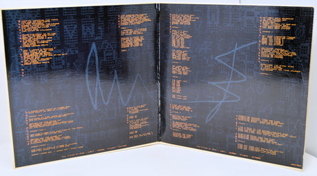 Open book with text and blue wave graphics on a black background
