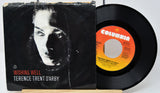 Front cover of Wishing Well 45 RPM vinyl single by Terence Trent D'Arby with record partially showing