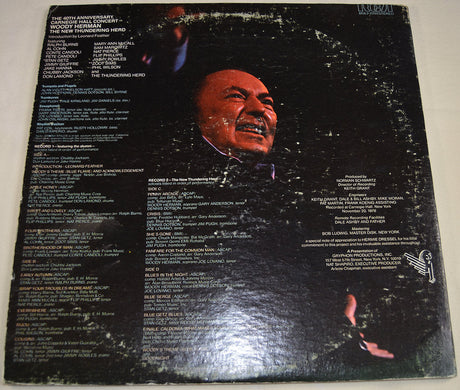 Back cover of Woody Herman’s Carnegie Hall concert album featuring credits and an expressive portrait