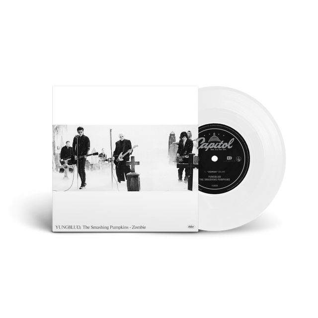 Vinyl record with a black and white album cover featuring a band on a white background