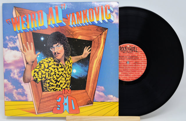 Vinyl record with cover featuring 'Weird Al' Yankovic and a colorful design.