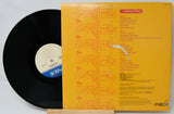 Vinyl record with yellow back cover featuring text and logo containing song titles from Yardbirds A Compleat Collection