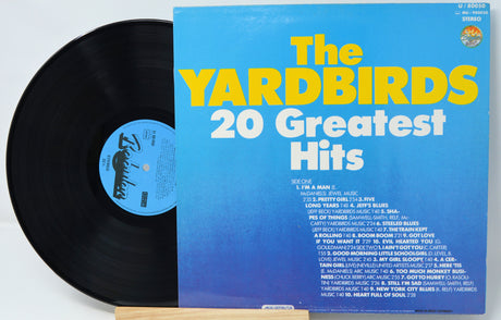 Vinyl record and cover titled 'The Yardbirds 20 Greatest Hits' on a white background