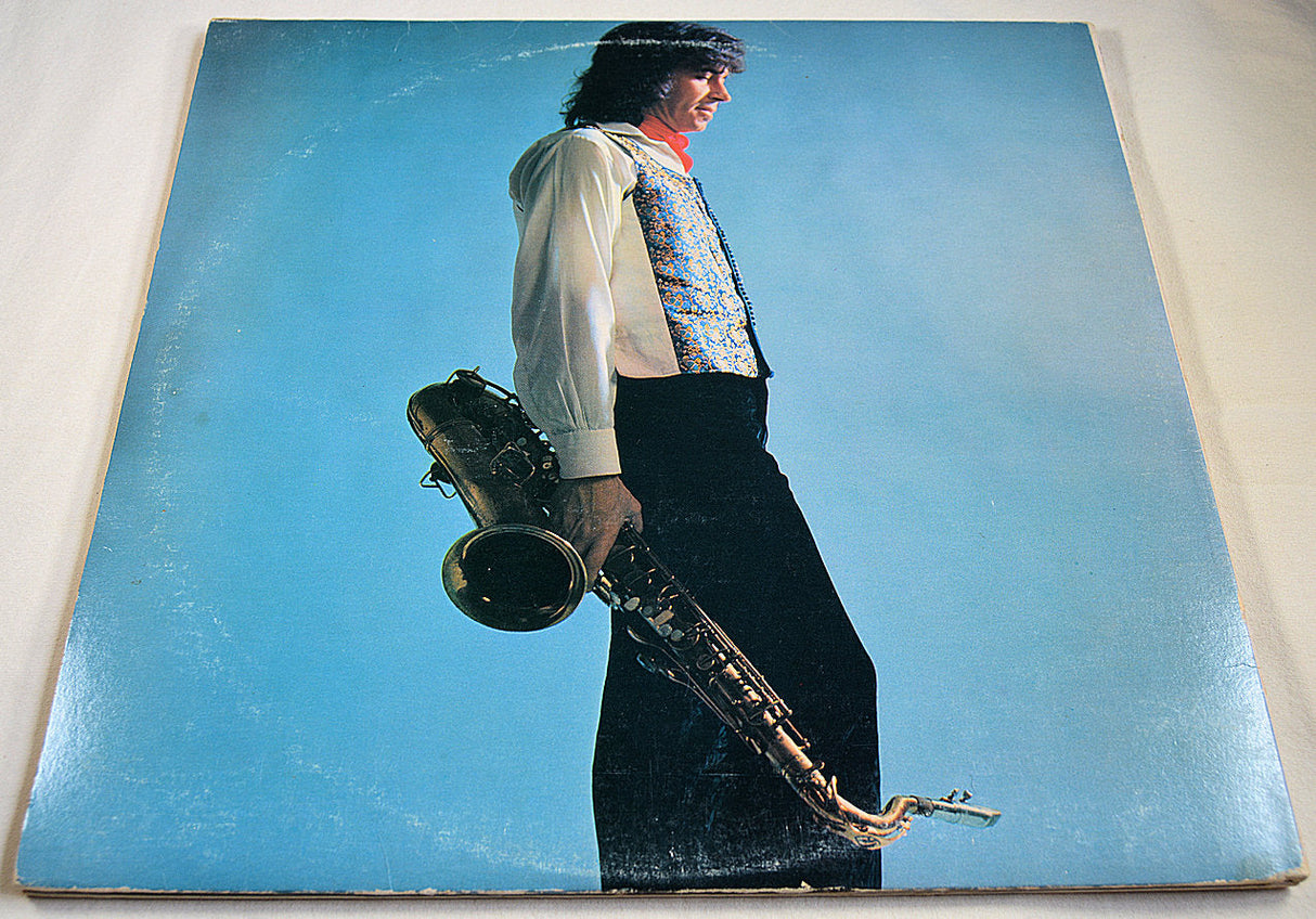 Front cover of Gato Barbieri's Yesterdays album with him holding a saxophone