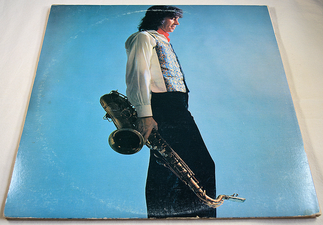 Front cover of Gato Barbieri's Yesterdays album with him holding a saxophone