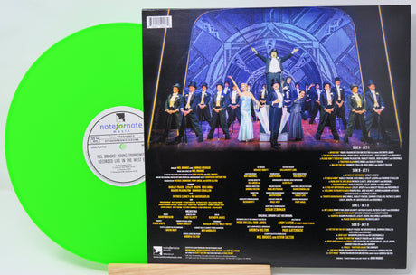 Black vinyl record with a white label featuring 'mullco' branding on a light gray background.